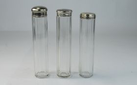 A Trio Of Silver Topped Glass Pin Jars, Hallmarked And Marked Silver,