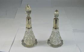 Edwardian Pair Of Silver Topped Cut Glass Scent Bottles, Hallmark London 1904, 6" and 7.
