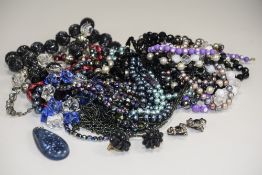 Mixed Lot Of Costume Jewellery Comprising Beads, Earrings, Brooches etc.