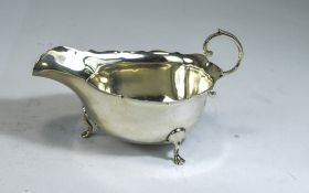 Edwardian Silver Sauce Boat, With Wavy Edge Border And Raised On 3 Splayed Feet,