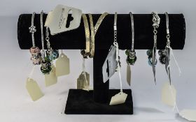 Traders Ex Stock, A Collection Of Silver Bangles And Bracelets, Some Stone Set,