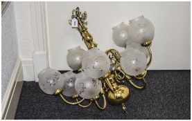 Modern Ten Branch Brass Ceiling Light Complete With Globular Frosted Glass Shades