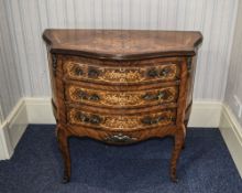 A Louis XV Style Kingwood and Ormolu Mounted Serpentine Front Bombe Commode,