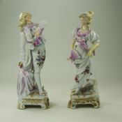 Pair of German Porcelain Figures, a couple dressed in 18th century costume,