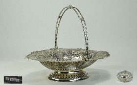 Victorian Very Fine Ornate Latice Work and Pierce Swing Handle Basked- Footed Bowl.