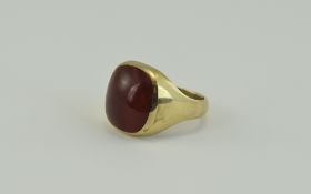 Gents 9 carat Gold Single Stone Dress Ring set in a large semi precious hard stone to centre.