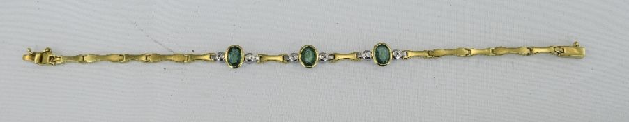 Ladies 18ct Gold Diamond And Emerald Bracelet, Three Rubover Set Oval Emeralds Each Between Two