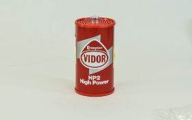 Modern Radio in the form of a battery marked VIDOR HP2 High Power. 5 inches in height.