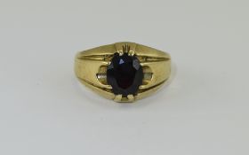 9 Carat Gold Gypsy Set Single Stone Garnet Dress Ring. Fully hallmarked for 9 carat gold.