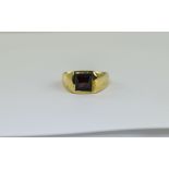 A Nice Quality 9ct Gold Set Single Stone Ring, The Central Emerald Cut Garnet of Good Colour.