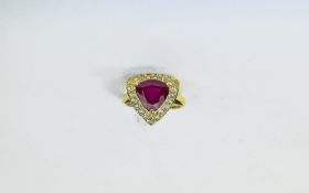 Ruby and White Topaz Trillion Ring, a trillion cut, rich red ruby of 6.3cts, framed with 1ct of