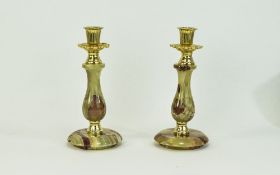 A Pair of 1960's Onyx Candlesticks. 8.25 Inches High.