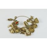A Good Quality Vintage 9ct Gold Charm Bracelet with Chain and Padlock,