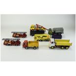 A Collection of Vintage Dinky and Matchbox Scale Diecast Model Trucks, Fire Engines, Refuse Wagon