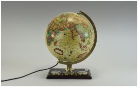 A Vintage Table Globe combined with barometer and thermometer.