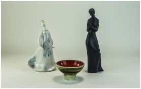 Three Pieces Of Pottery Comprising A Small Poole Footed Dish, Height 2¾ Inches, Royal Doulton Figure