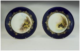 Royal Worcester Pair of Dessert Plates 'Water Birds', each hand painted over print, signed C.