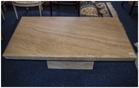 Modern Stone Coloured Marble Coffee Table of rectangular form on marble block. 51 by 27 inches.