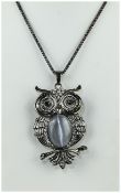 Butler & Wilson Style Owl Pendant and Chain, a large owl figure set with an oval grey faux cat's eye