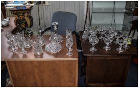 Collection of Cut Glass Items including decanters, white wine glasses, red wine glasses, tankards,