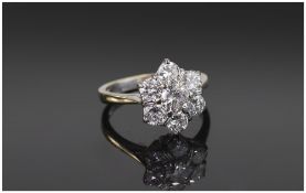 18 Carat White Gold Set Seven Stone Diamond Cluster Ring, flower head setting.