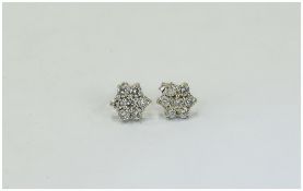 White Gold Diamond Earrings Each Set With 7 Round Modern Brilliant Cut Diamonds, Flower Head Design,
