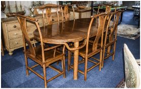 Chinese Hardwood Dining Suite Comprising An Extending Oval Table 79 x 39 Inches, Height 31 Inches.