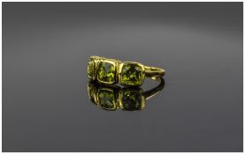 Peridot Three Stone Ring, three cushion cut peridots, bezel set in a row in 14ct gold vermeil and