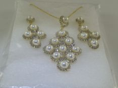 White Faux Pearl and Crystal Pendant Necklace and Earrings Set, the three pendant pieces