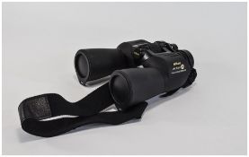 Nikon Action EX Binoculars 10 x 50 CF appears unused. Complete with box and carry case.