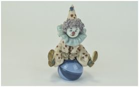 Lladro Figure "Having a ball" Model number 5813, issued 1991. Height 6.75" inches.