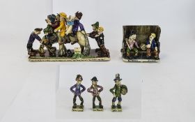 Will Young Runnaford Pottery A collection of 'Will Young Widecombe fair groups and figures. Seated