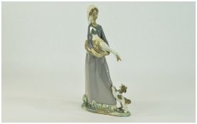 Lladro Figure ' Girl with Goose and Dog ' Model Num 4866. Issued 1974 - 1993. Height 10.5 Inches.