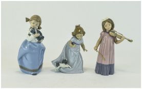 Nao by Lladro Figures ( 3 ) In Total. 1/ Girl with Violin, 7.5 Inches High. 2/ Playful Puppy, 6.
