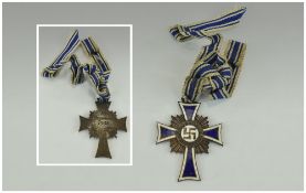 World War II, German- Mothers Bronze Cross of Honour (1st Version) 3rd Class Complete with Ribbon.