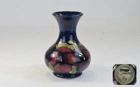 W. Moorcroft Bulbous Shaped Blue ' Pansy ' Vase. Stands 5.5 Inches High.