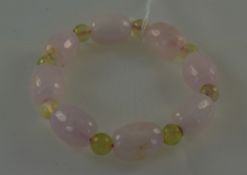 Rose Quartz and Prehnite Bracelet, faceted ovoid beads of rose quartz interspaced with small round