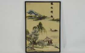 Oriental Framed Silk Depicting Landscape, Pagoda, Figures, Lake. 14 by 21 inches.