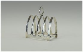 Art Deco Silver 4 Tier Toast Rack, of nice quality. Excellent condition Maker E Viner.