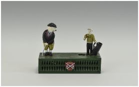 Novelty Hand Painted Cast Iron Golfing Money Box. Late 20th Century, size 6.5" inches high, 8.