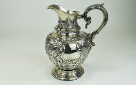 European Mid 19th Century Very Impressive Embossed Silver Jug.