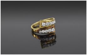 Ladies 18 Carat Twin Channel Set Diamond Ring. The ten brilliant diamond of good colour and clarity.