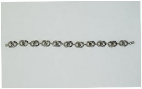 9 Carat White Gold Black and White Diamond Bracelet interlocking ring links, hallmarked. Length 7.