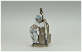 Lladro Figure "Jazz Bass" Model number 5834, issued 1991. 10" inches high.