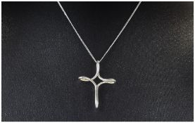 Silver Tiffany Infinity Cross on chain, a design by Elsa Peretti,