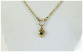 9ct Gold Heart Shaped Pendant Set With A Heart Shaped Amethyst Suspended On A 17 Inch Gold Chain.