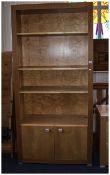 Large Oak and Beach Bookcase 4 shelves with drawers below.
