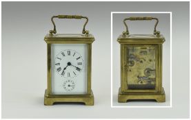 English 19th Century Brass Carriage Alarm Clock. With alarm strikes on a bell.