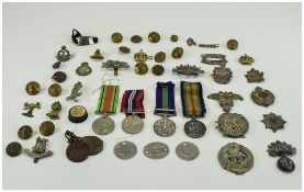 Military Interest Collection Of War Medals And Cap Badges.