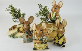 Collection of Pendelfin comprising mother rabbit, uncle Soames, father rabbit, mother and baby.
